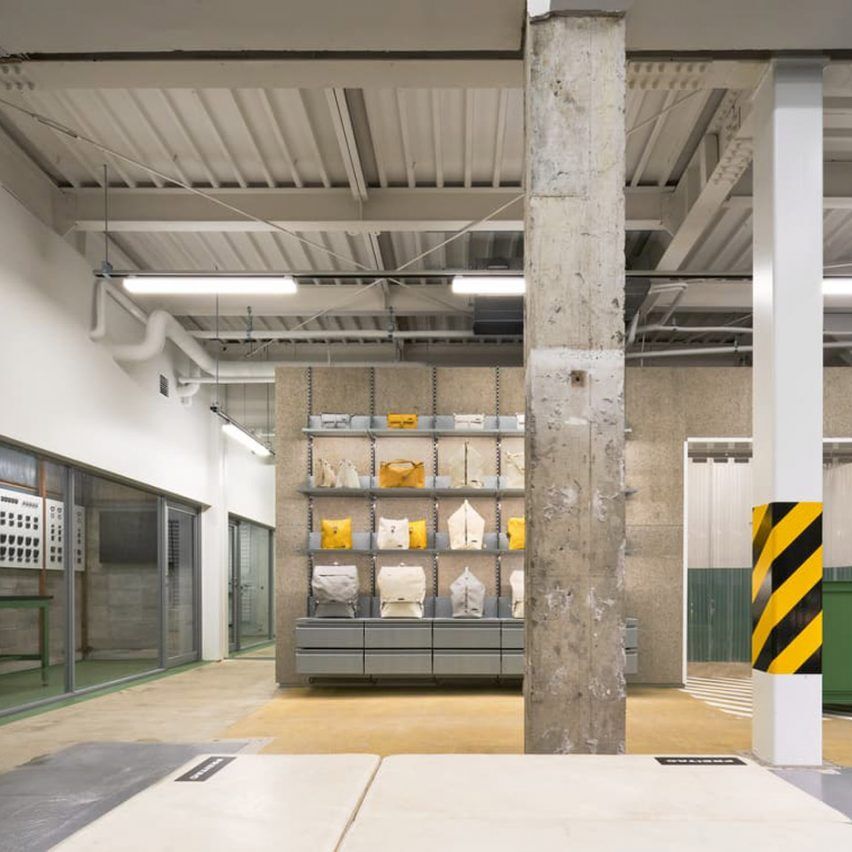 Freitag-store-in-Kyoto-is-designed-to-resemble-the-brands-own-warehouse